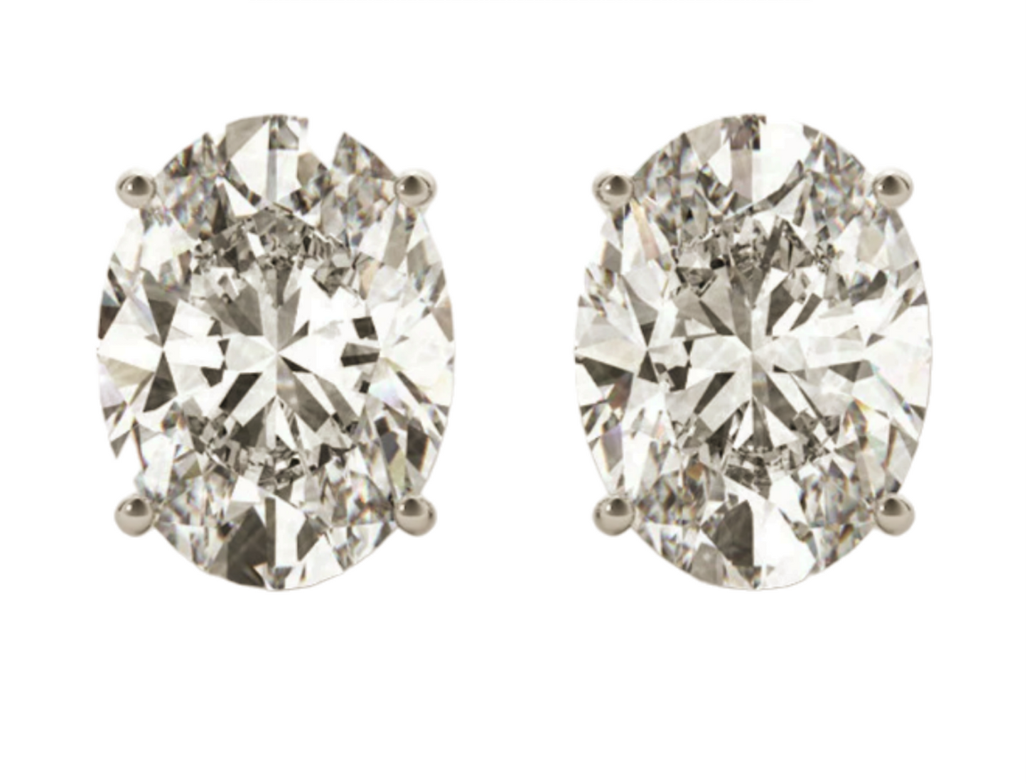Orecchini punto luce in oro bianco 18k con 2 diamanti naturali taglioovale 0,20 ct
