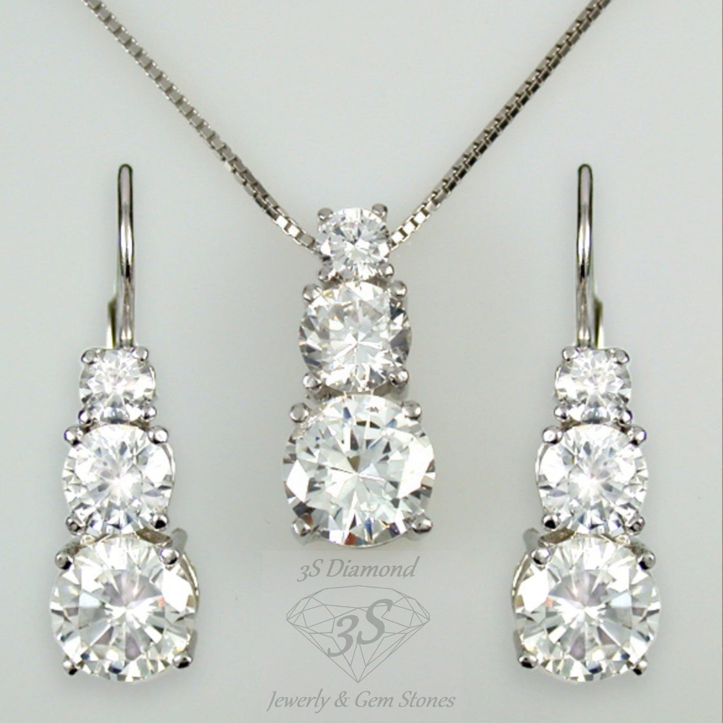 set completo trilogy ciondolo e orecchini punto luce in oro bianco 18k 750 e 9 diamanti naturali 2,10 ct E F