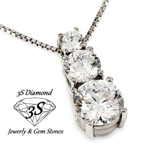 ciondolo trilogy in oro bianco 18k e 3 diamanti naturali 0,65 ct