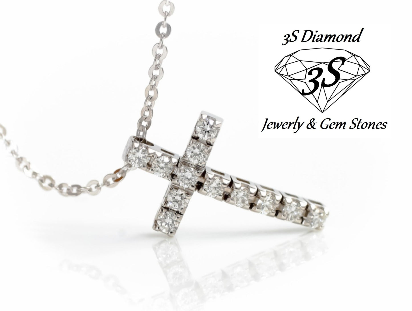 ciondolo croce in oro bianco 18k e 11 diamanti naturali 0,99 ct