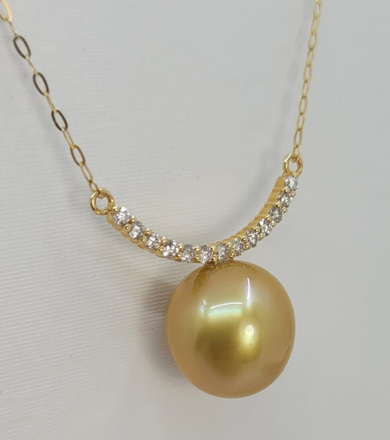 Collana in oro 18k e diamanti naturali 0.30ct e perle australiana 10mm