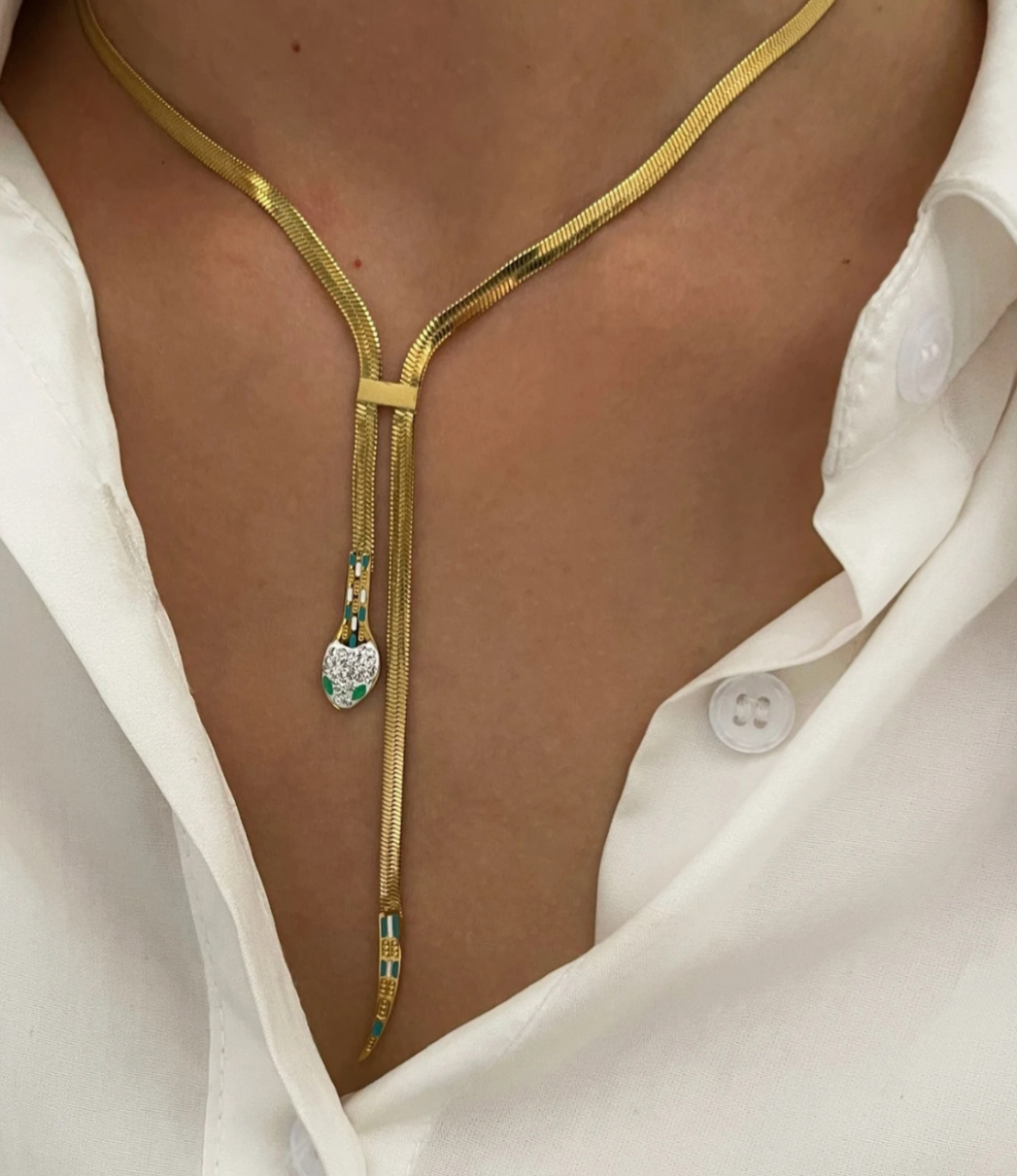 collana pendente serpente in oro giallo con diamanti naturali e smeraldo