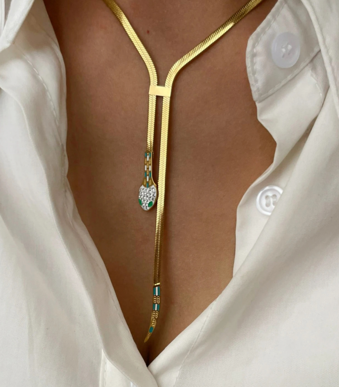 collana pendente serpente in oro giallo con diamanti naturali e smeraldo