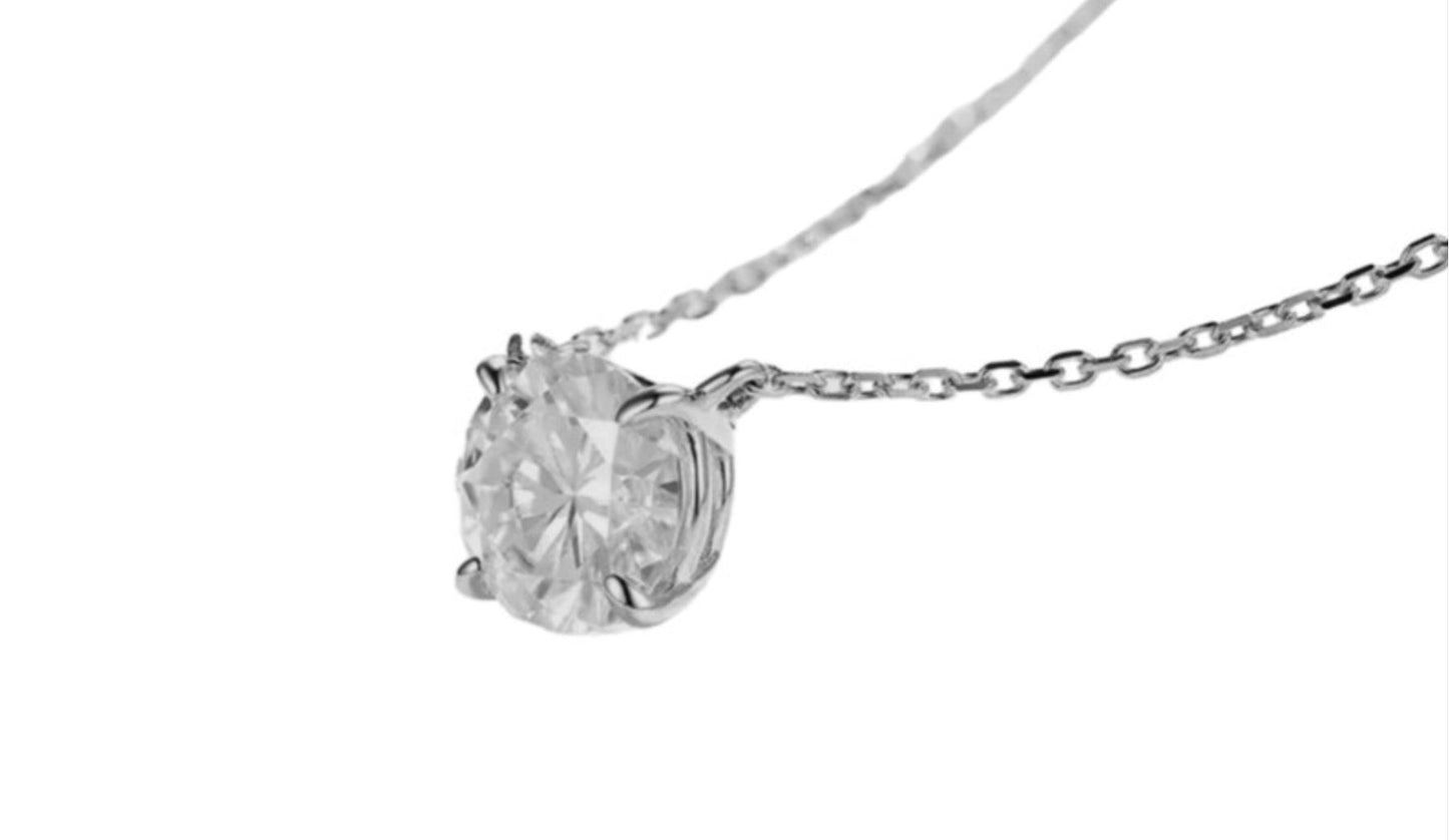 ciondolo punto luce certificato HRD in oro bianco e diamante naturale  0,39ct