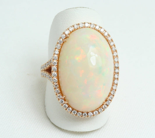 Anello in oro giallo e diamanti naturali 0.81ct  e opale 16.30ct